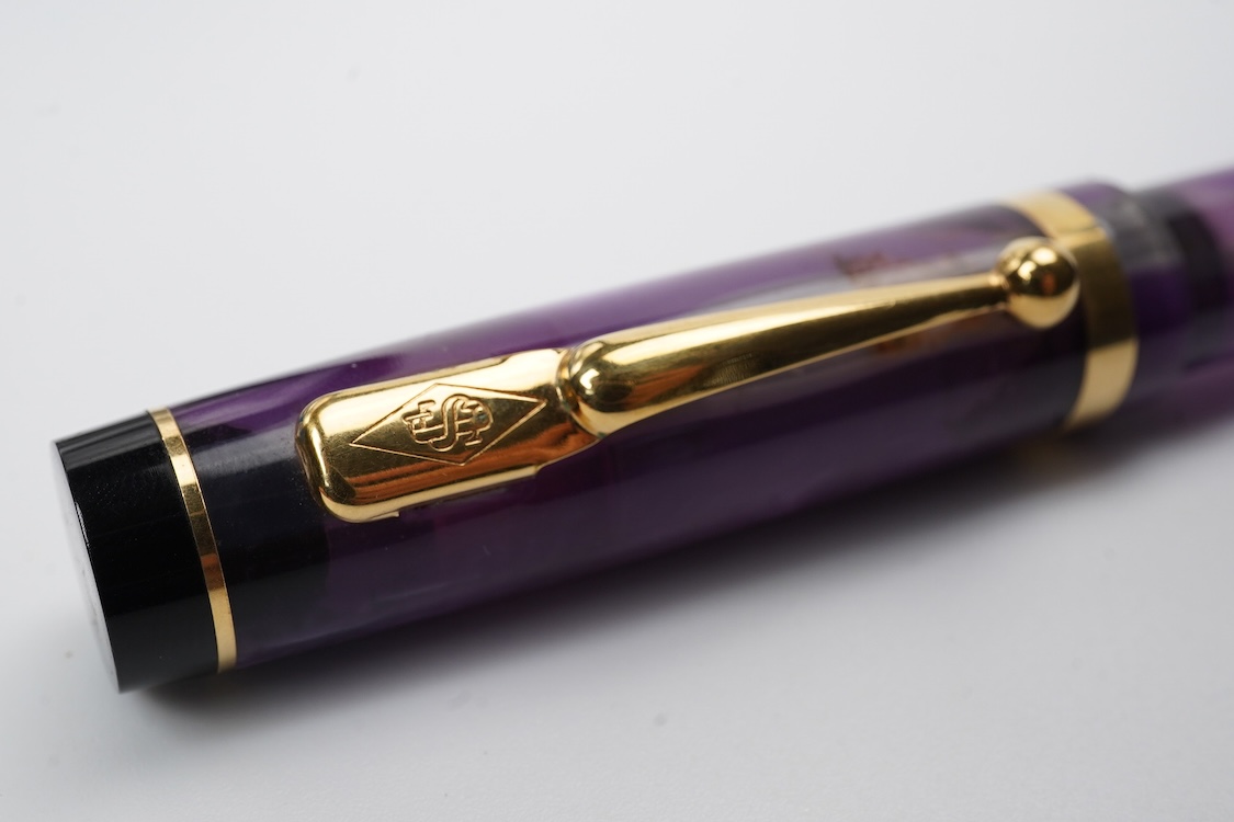 A modern Conway Stewart 'Duro' in stunning purple fitted with 18ct. gold medium nib